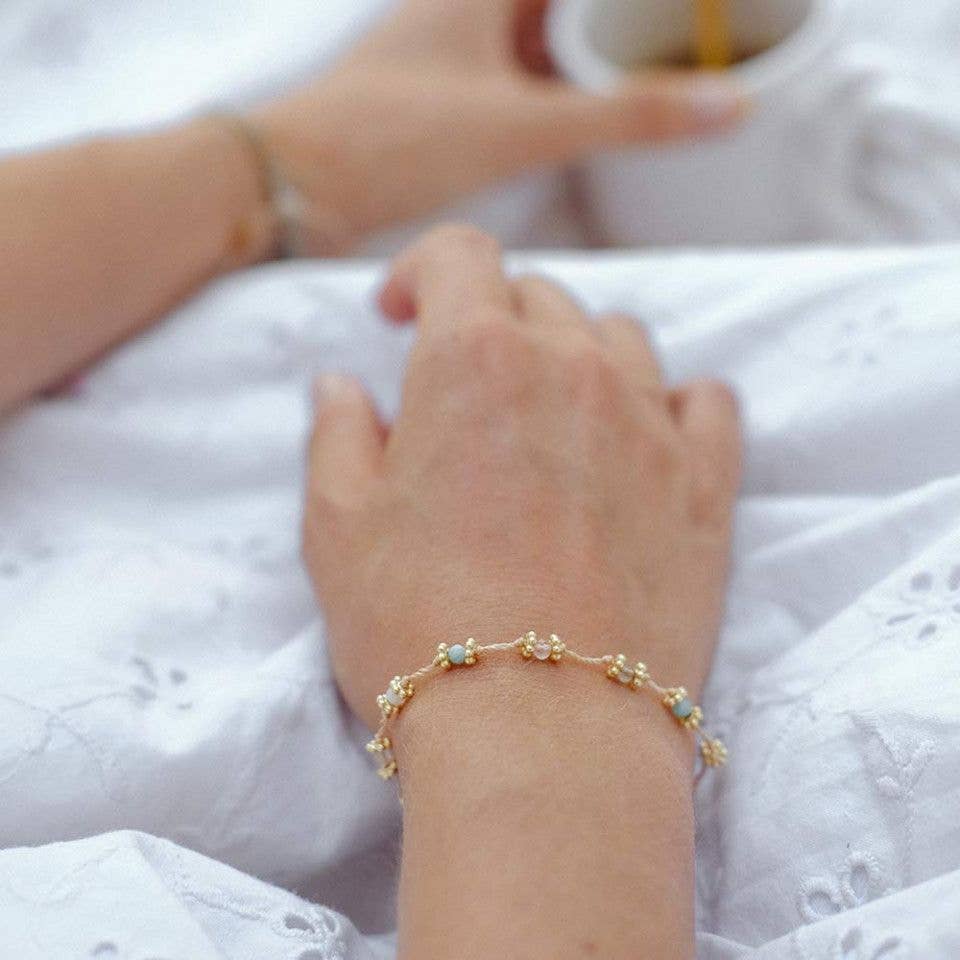 Motherhood bracelet with 9 symbolic stones