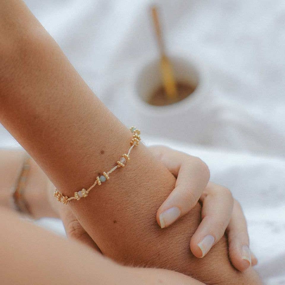 Motherhood bracelet with 9 symbolic stones