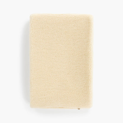 Lagen i 100% børstet merinould til babyseng 60x120 cm