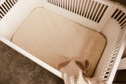 Lagen i 100% børstet merinould til babyseng 60x120 cm