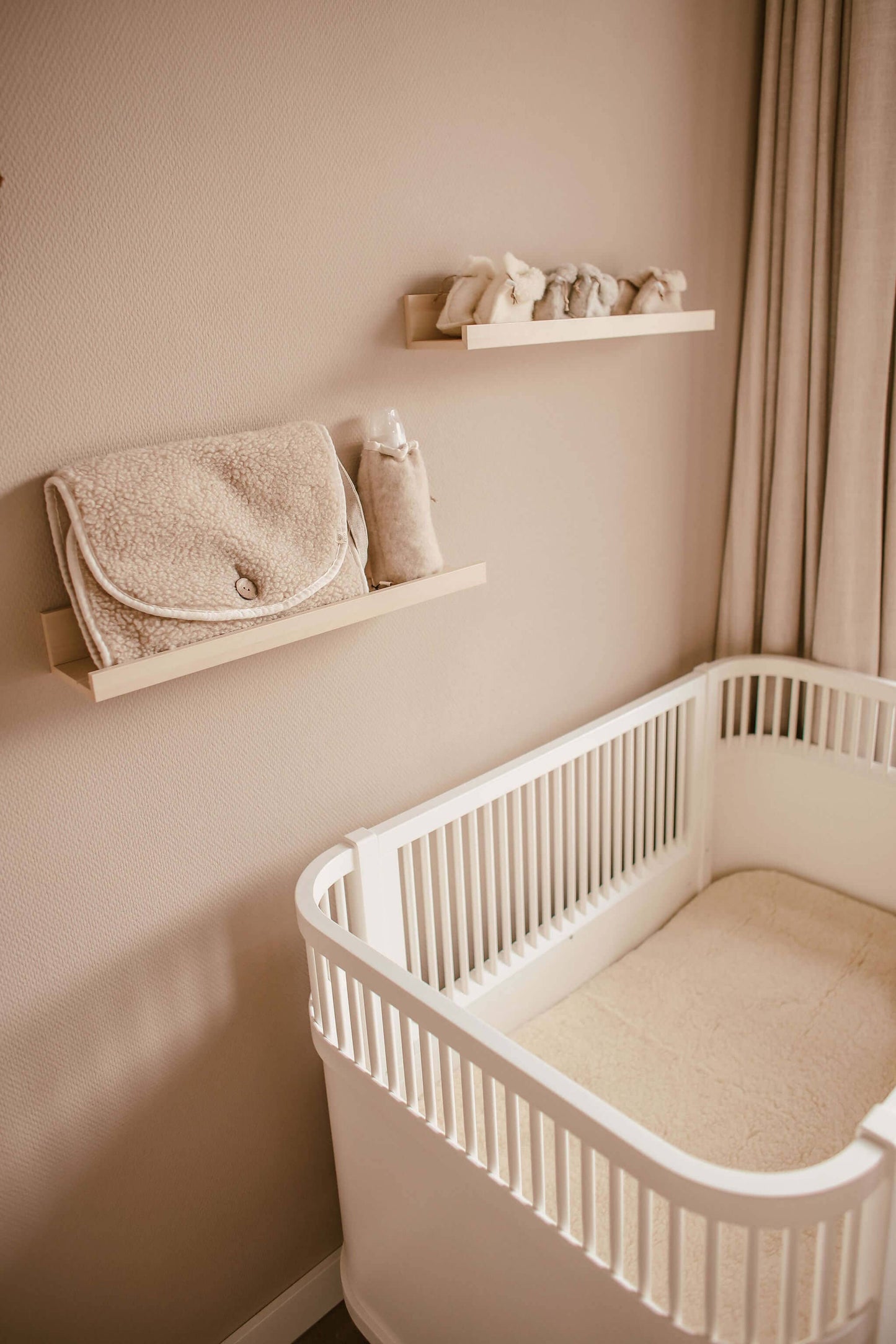 Lagen i 100% børstet merinould til babyseng 60x120 cm